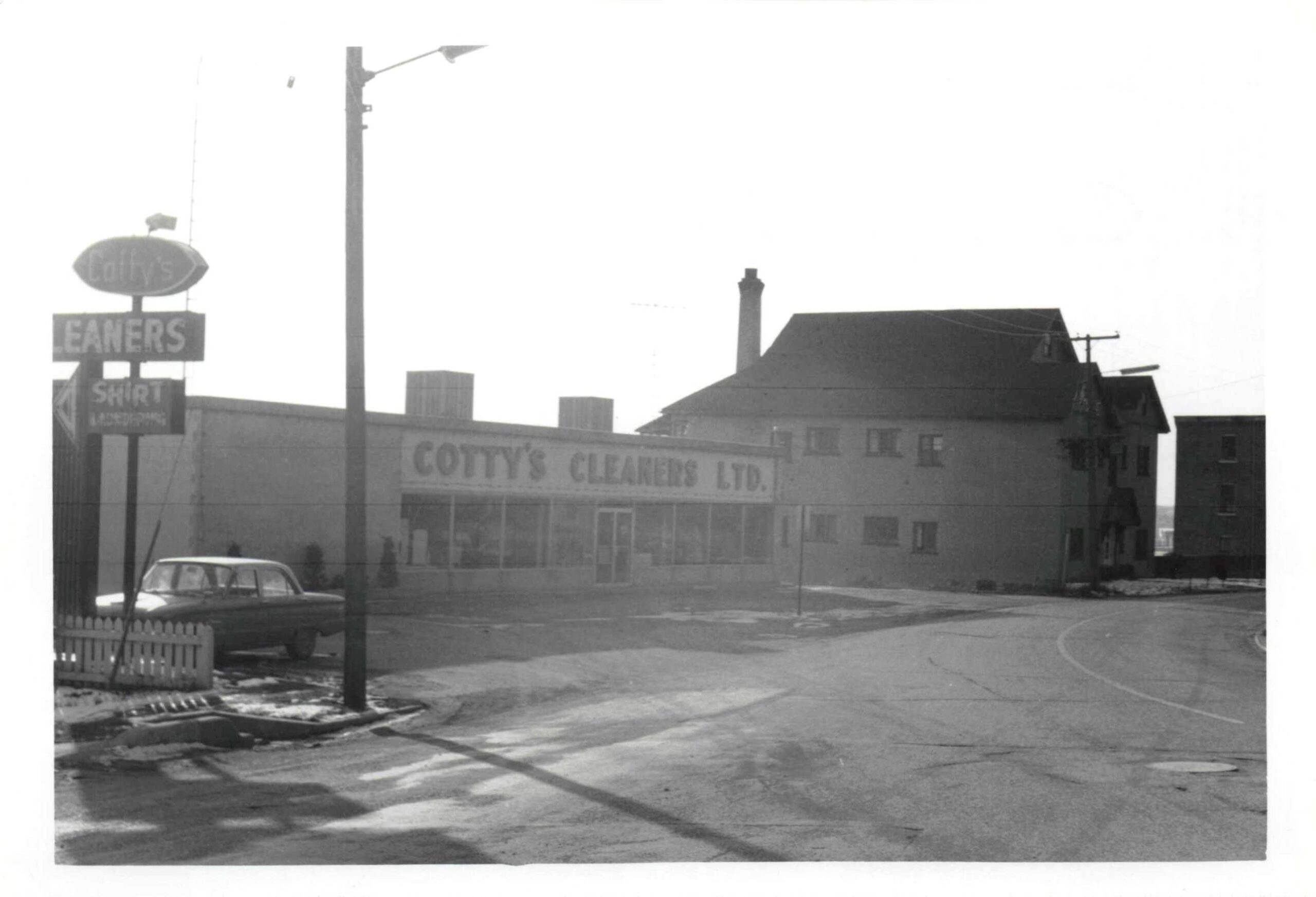 Vintage photo of Cotty’s Cleaners on Dunlop Street in Barrie, Ontario, taken around 1965.